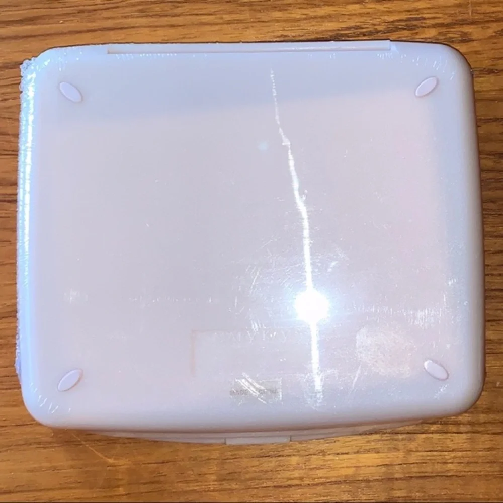 Mary Kay NWOT pink compact travel mirror. In original wrapping.
